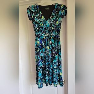 Flowy colorful midi dress with gathered wait and slight flare